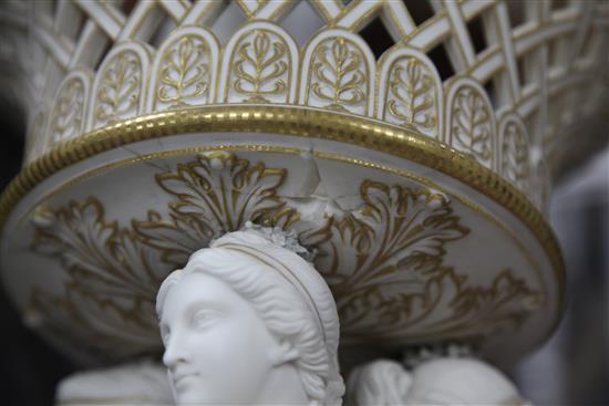 An impressive Copeland parian centrepiece, The Three Graces, 65.5cm, repair to basket